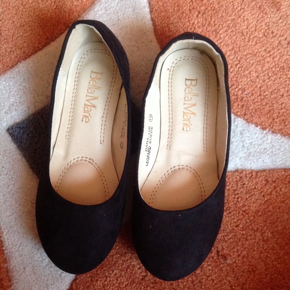 Black suede little girl shoes.